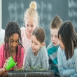  Elementary students in science class learning about plants